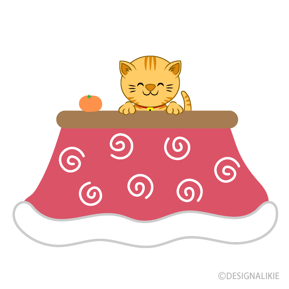 こたつから顔を出す猫