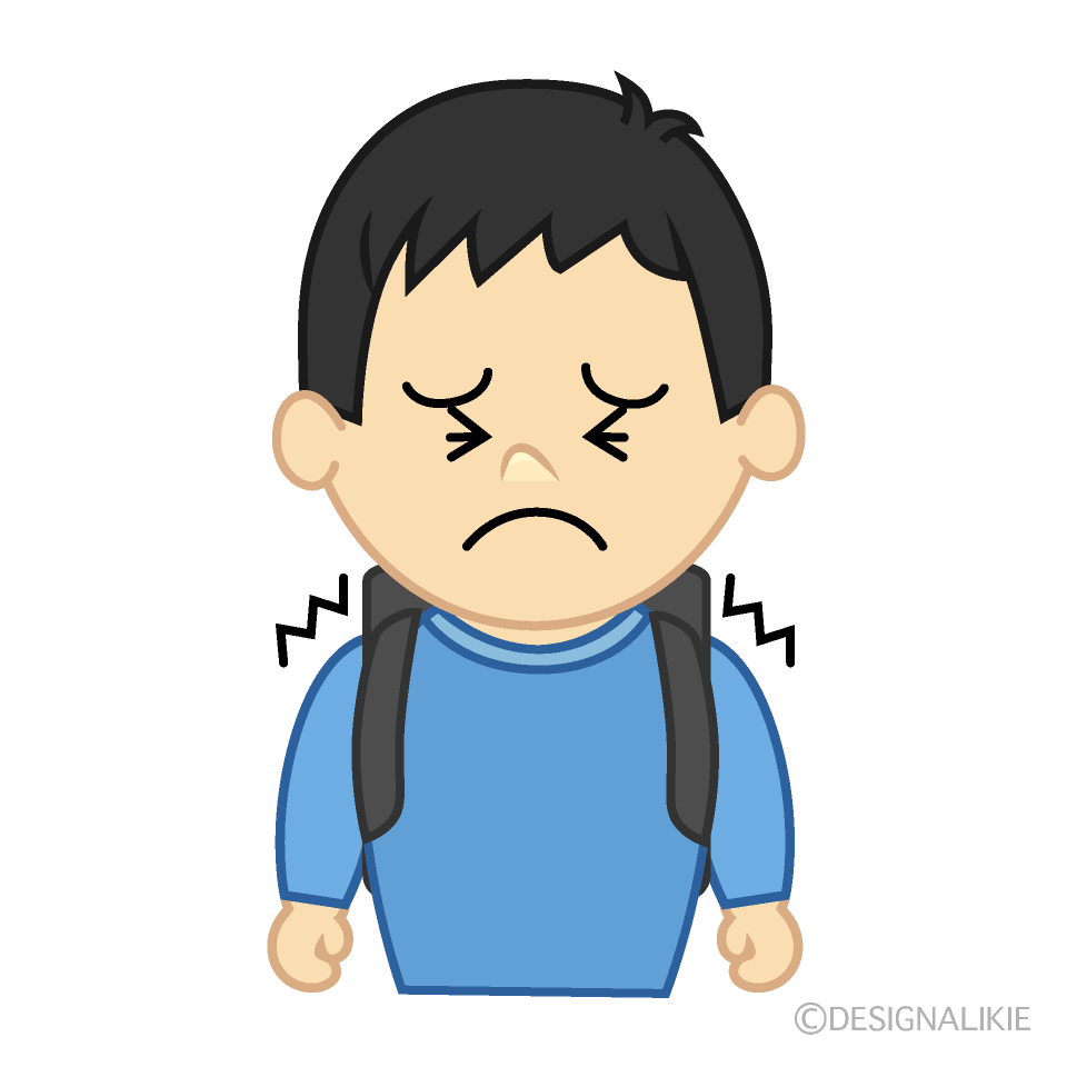 我慢する小学生男子