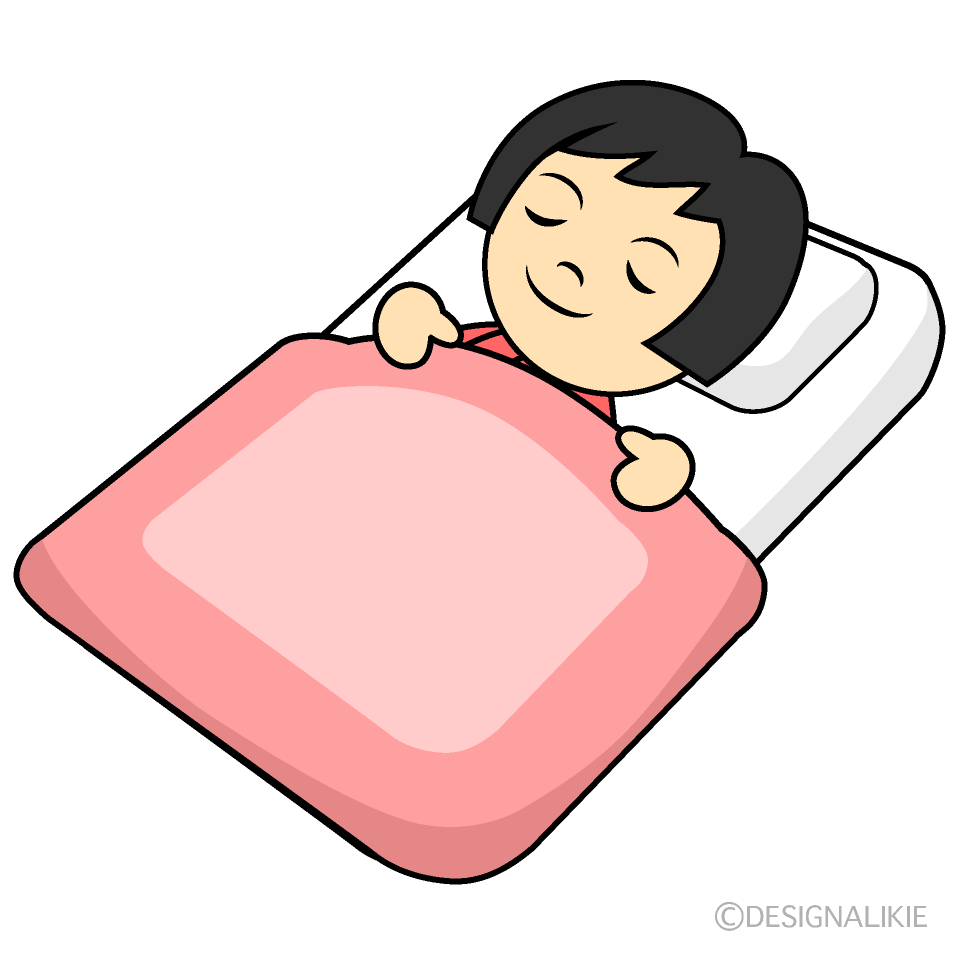 布団で寝る小さな女の子