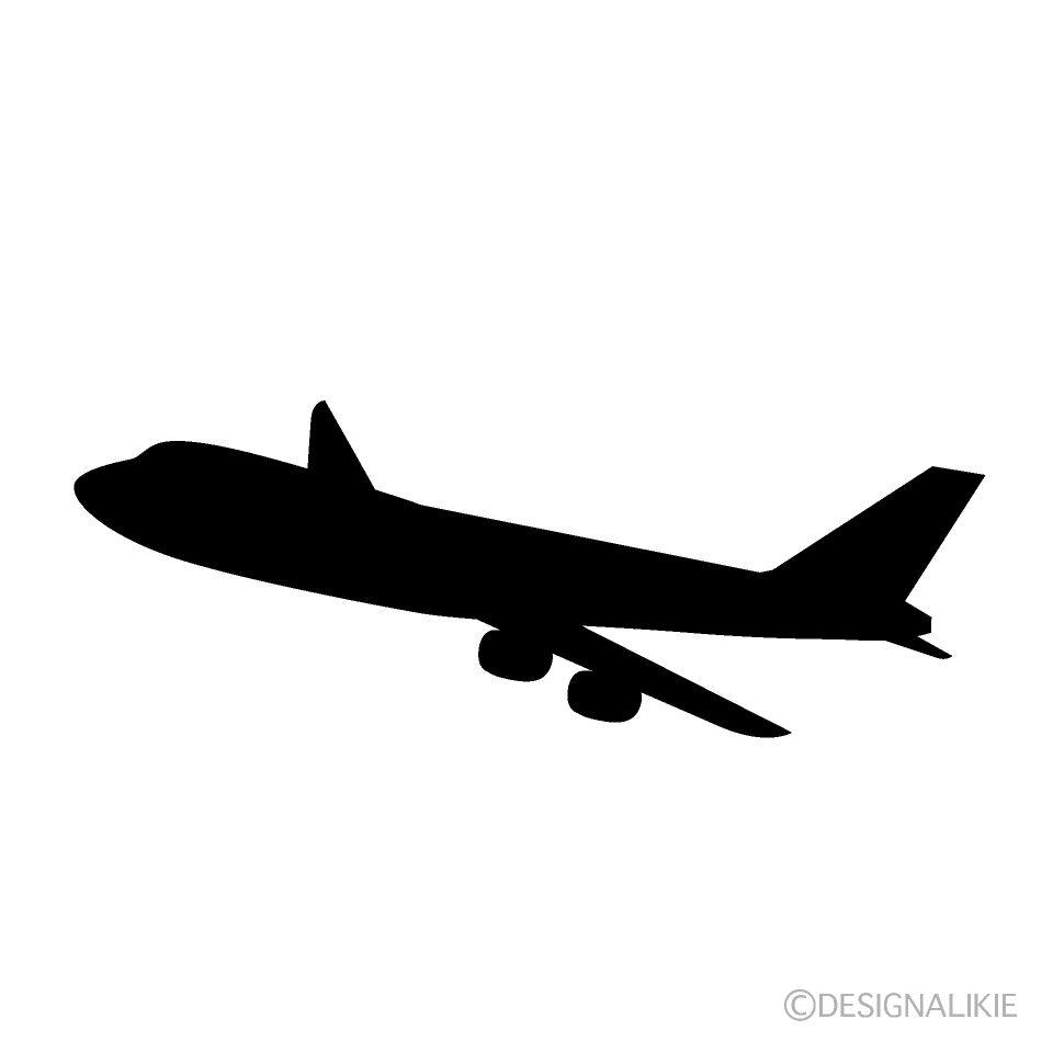 空を飛ぶ飛行機シルエット
