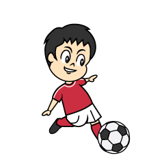 サッカーでキックする男の子